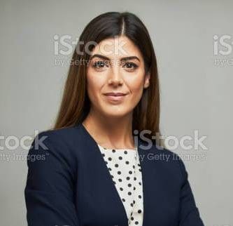 Studio headshot on white background. Spanish model.