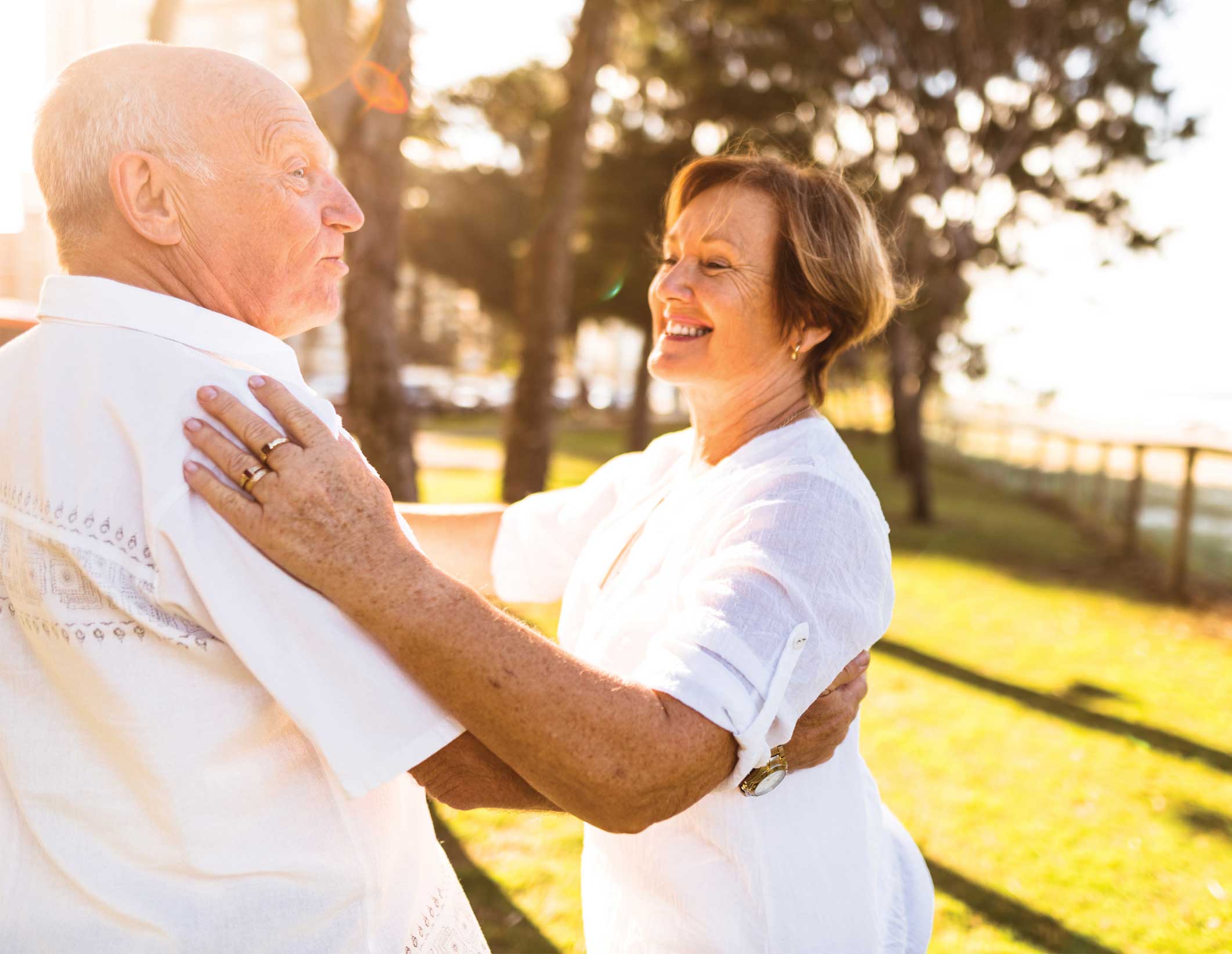A couple dancing outside at Quartet Senior Living.