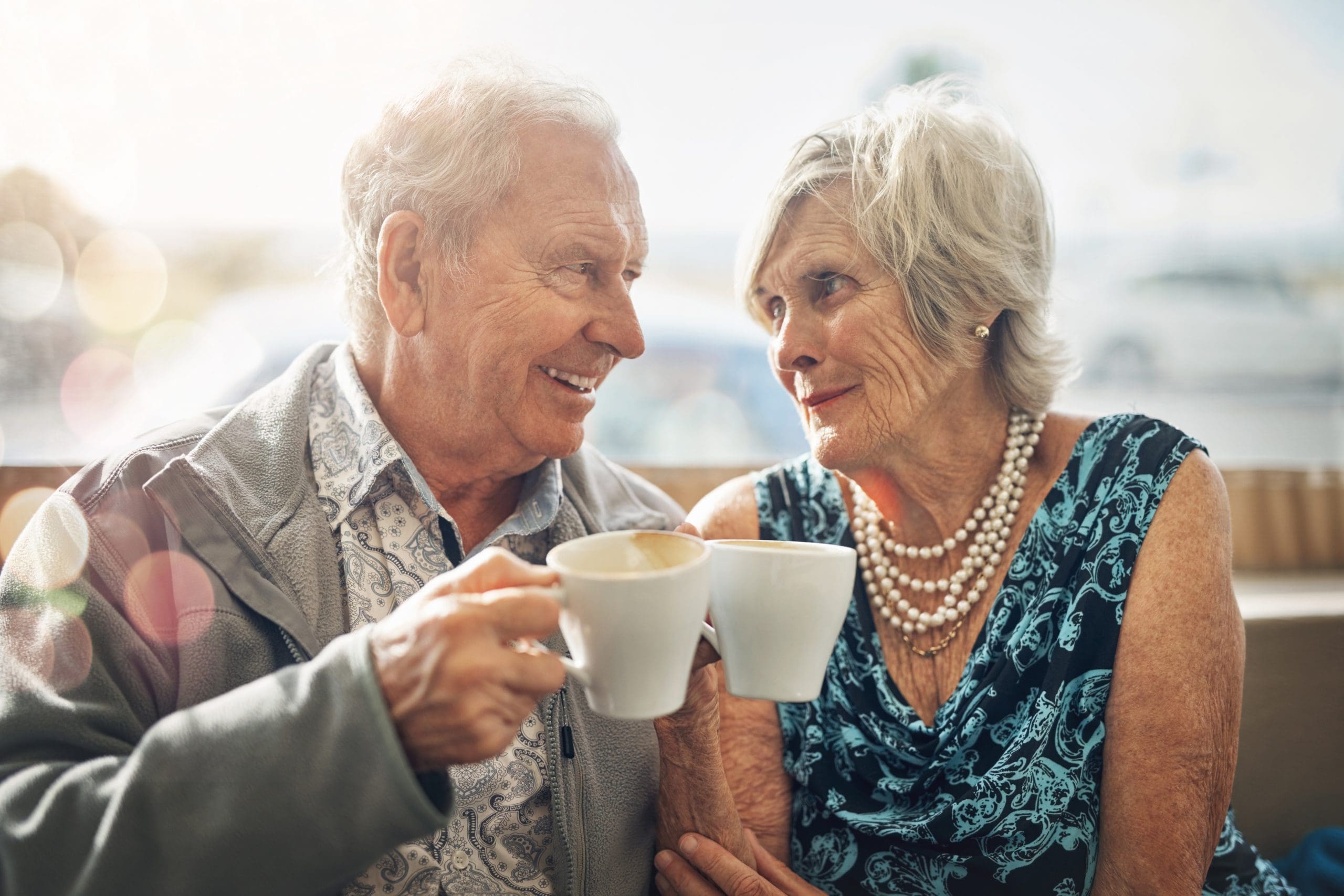 Shot of a mature couple spending the day together drinking coffee at Quartet Senior Living.