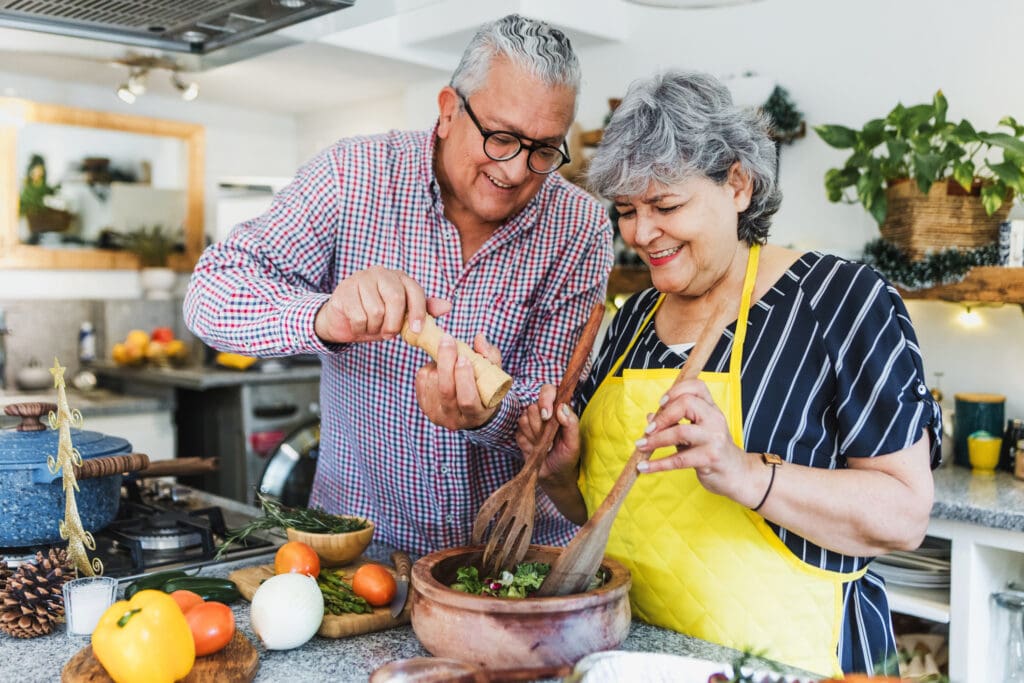 senior couple cooking together