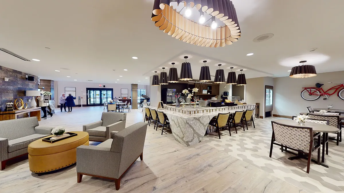 common-area-bar-lounge-quartet-living.jpg Tempo Bistro, an elegant and open common area with a bar and seating at Quartet Senior Living community in Bettendorf.